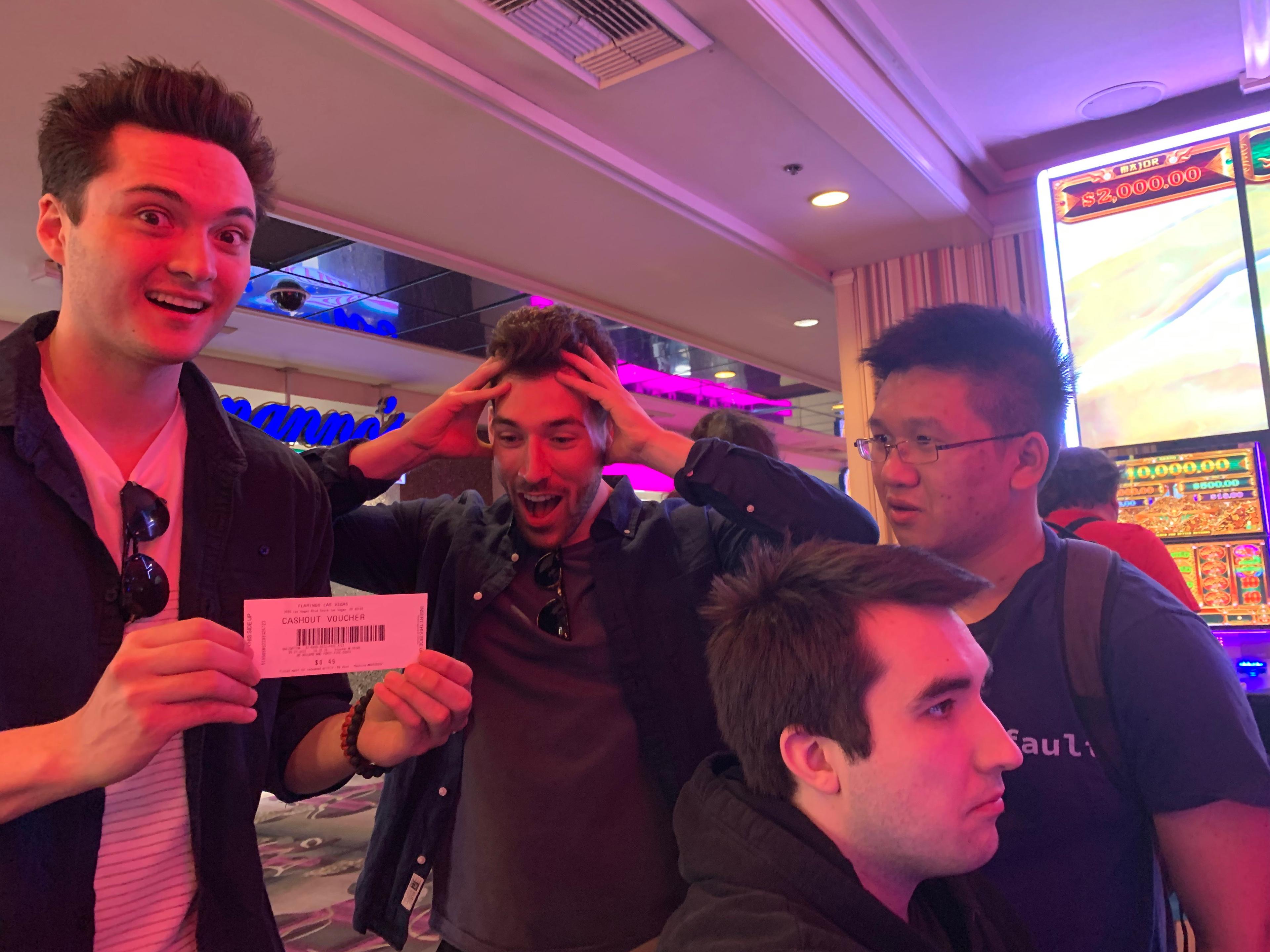 Ryan and friends at a Las Vegas casino reacting to a 45-cent slot-machine cashout voucher