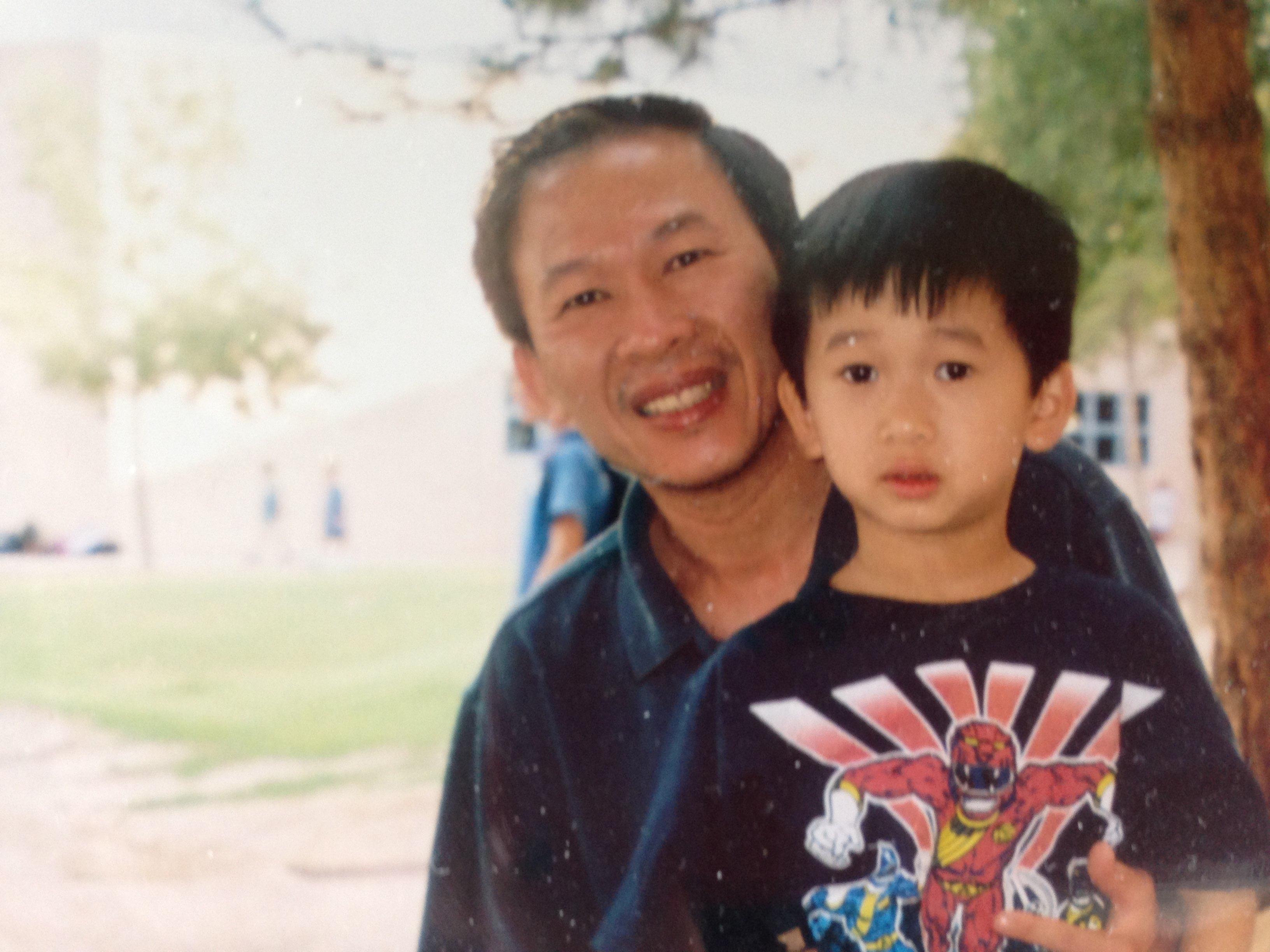 Kindergarten-age Ryan with his dad
