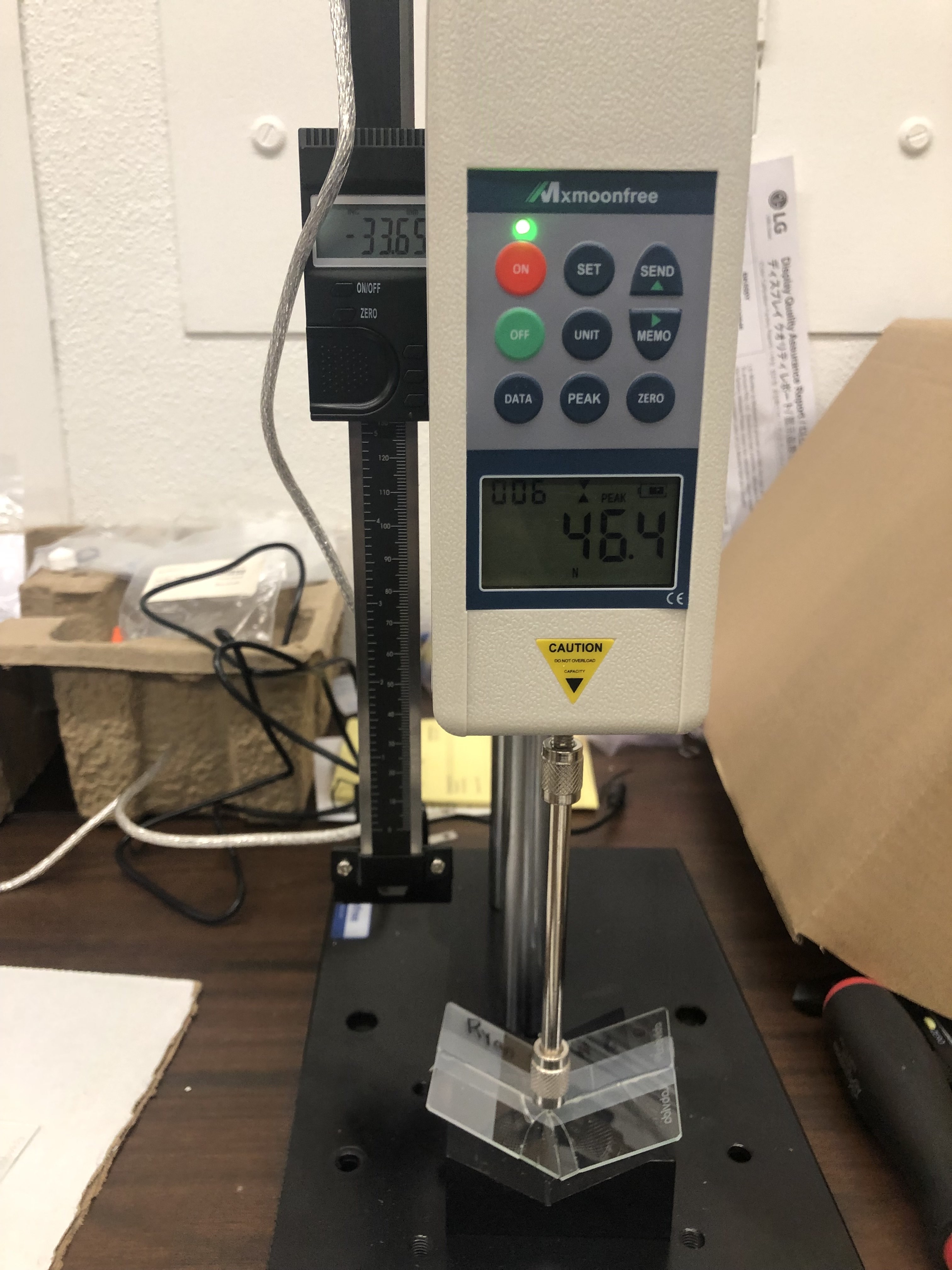 Force gauge reading 46.4 N during shear test